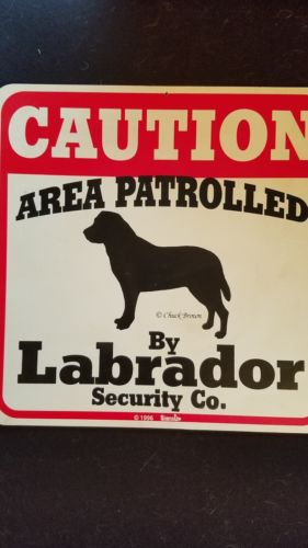 Caution area patrolled by Labrador Security Co. 1996 Chuck Brown sign