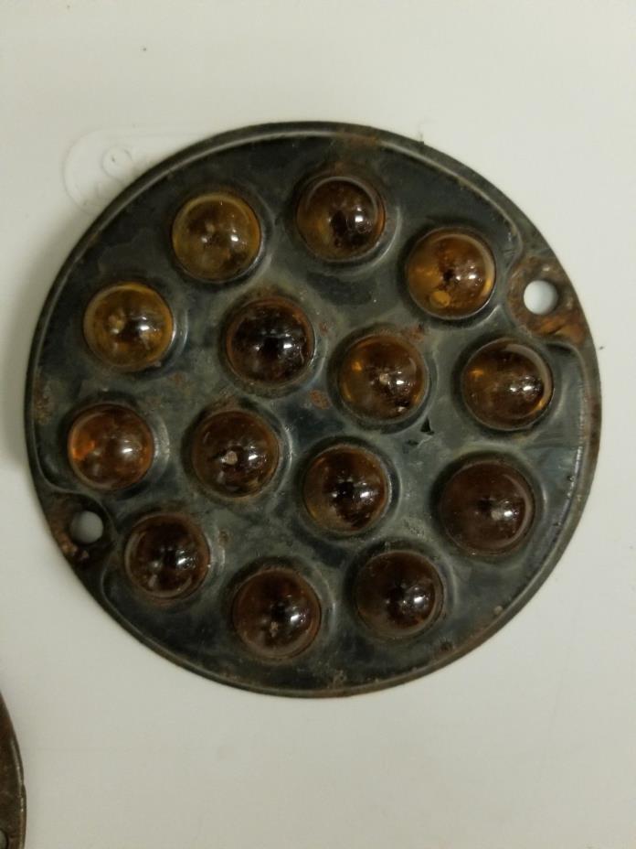 antique cats eye reflector -amber also red