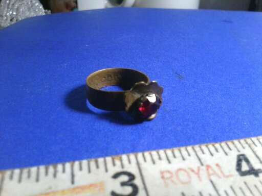 ANCIENT MEDIEVAL RING WITH RED STONE AND WRITING INSIDE MAYBE RUSSIAN OR CELTIC