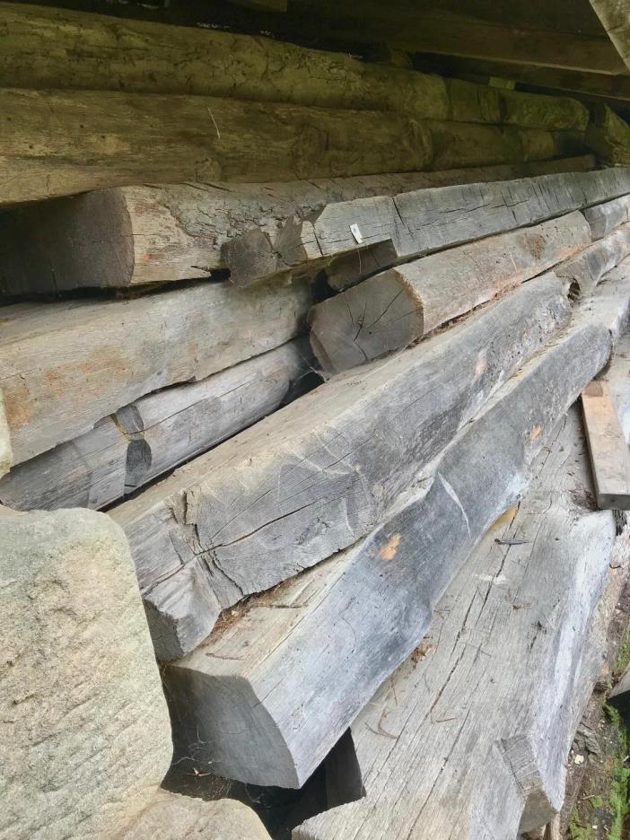 Hand Hewn Beams from old Log Cabin use for fireplace mantles - ceiling beams