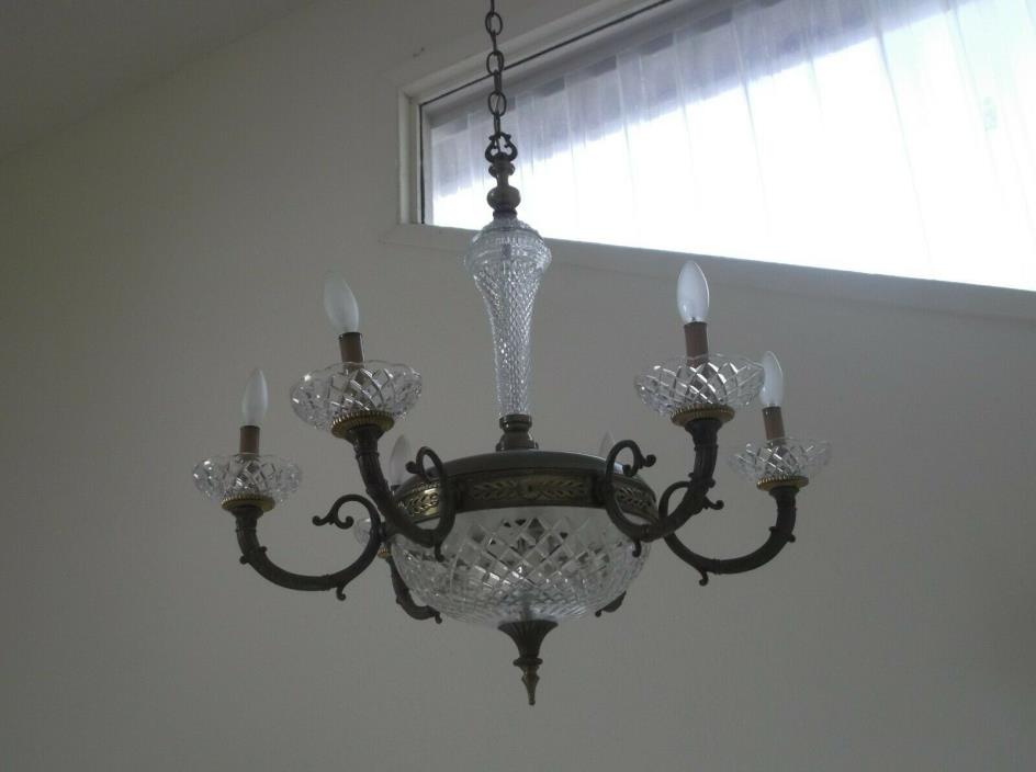 Traditional Bronze colored and crystal chandelier