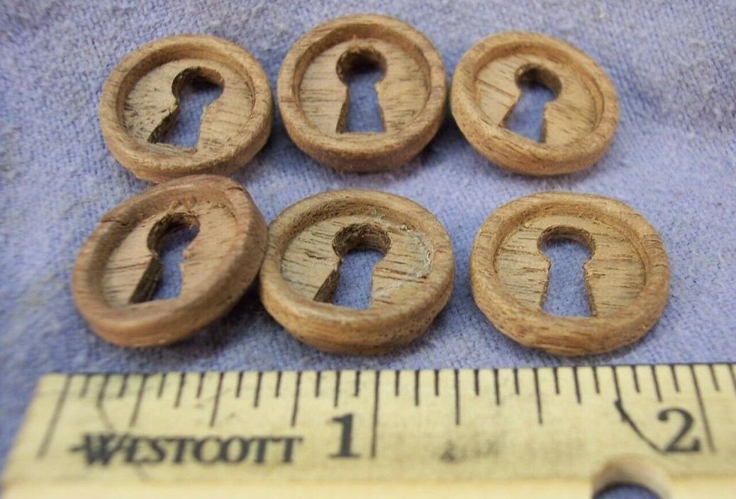 (6) ANTIQUE WALNUT KEY HOLES AS FOUND