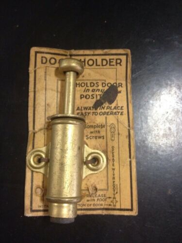 VINTAGE SPRING LOADED MECHANICAL DOOR HOLDER STOP ANTIQUE ON THE ORIGINAL CARD