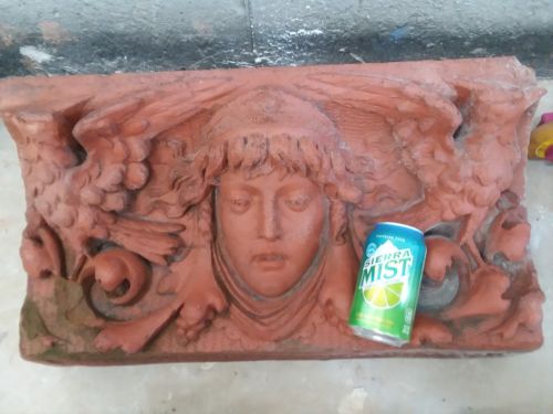 Architectural Terracotta panel with female face and birds