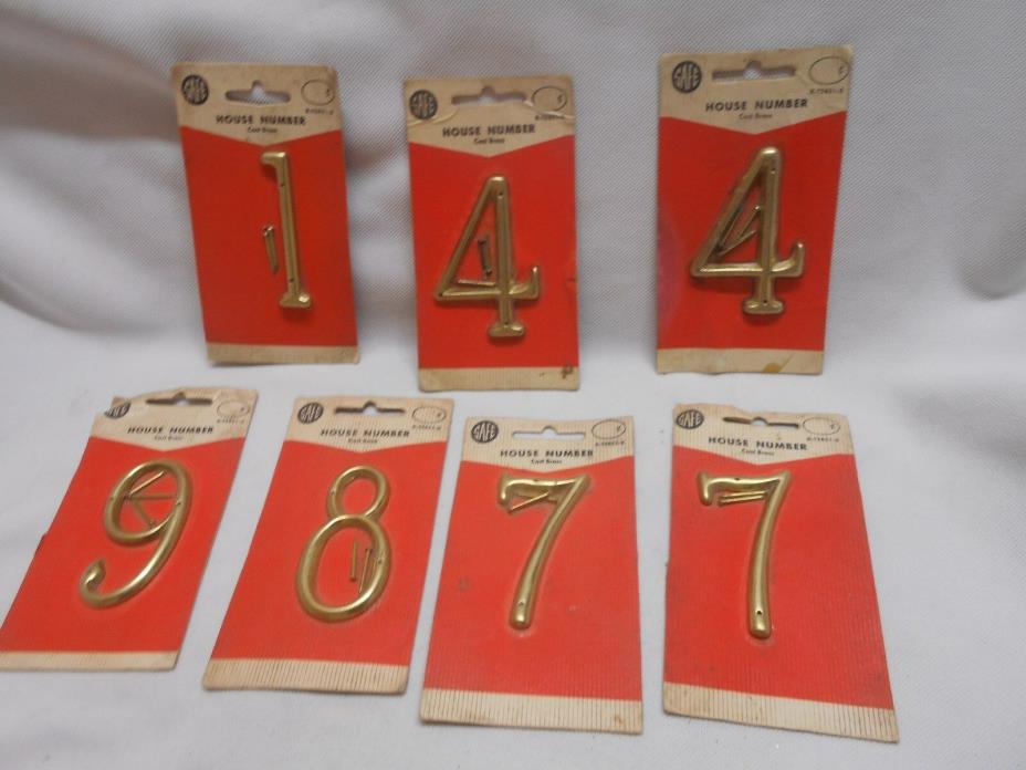7 vintage cast brass new old stock House Numbers 1,4,7,8, & 9