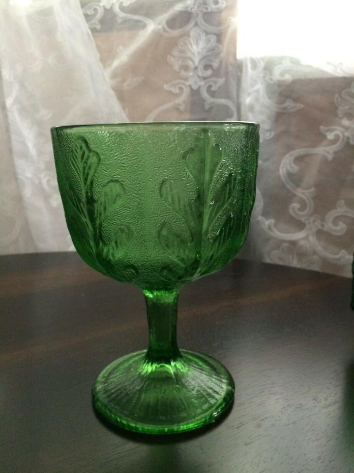 green large wine cup like candy dish with pedestal with raised design vintage