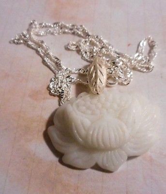 Handmade white natural Jade lotus flower pendant on silver chain..