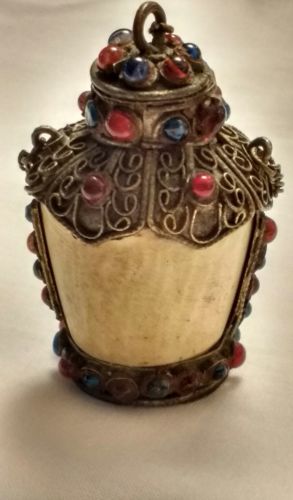 Vtg. antique opium/snuff bottle bone and brass with multi colored glass gems.