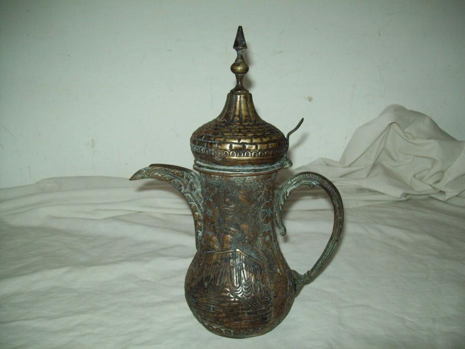 antique  Islamic copper Dallah coffe pot with embossed mosque design