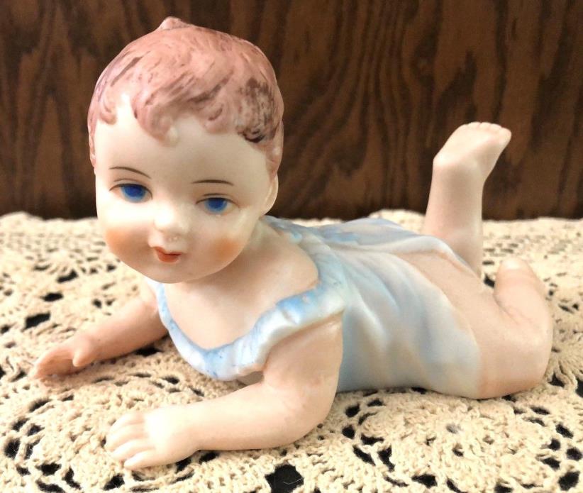 VINTAGE BISQUE PIANO BABY FIGURINE BROWN HAIR BLUE DRESS CRAWLING 5 1/2