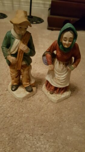 antique  man & woman figurine