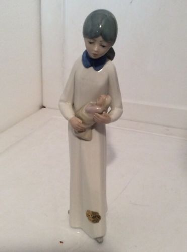 Casade Porcelain Figurine Woman Holding Baby