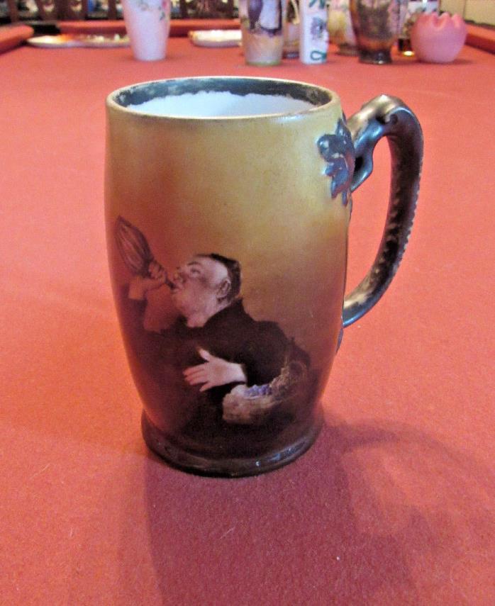 Dragon Handle Tankard with Hand Painted Monk; Crossed Swords Mark