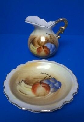 Hand painted, 3 1/2 inch ceramic porcelain pitcher and bowl set w/fruit design