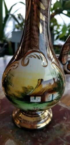 Belgium ceramic pair of pitchers