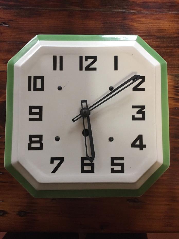 Art Deco Ceramic faced Pendulum Clock with metal hands,Very clean