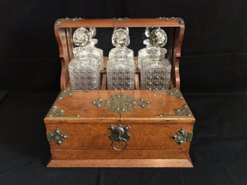 Antique English Oak Tantalus With Crystal Decanters & Bramah London Lock & Key