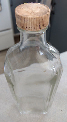COLLECTOR - HENRY W WAMPOLE - CLEAR GLASS BOTTLE WITH CAP - MEDECINE