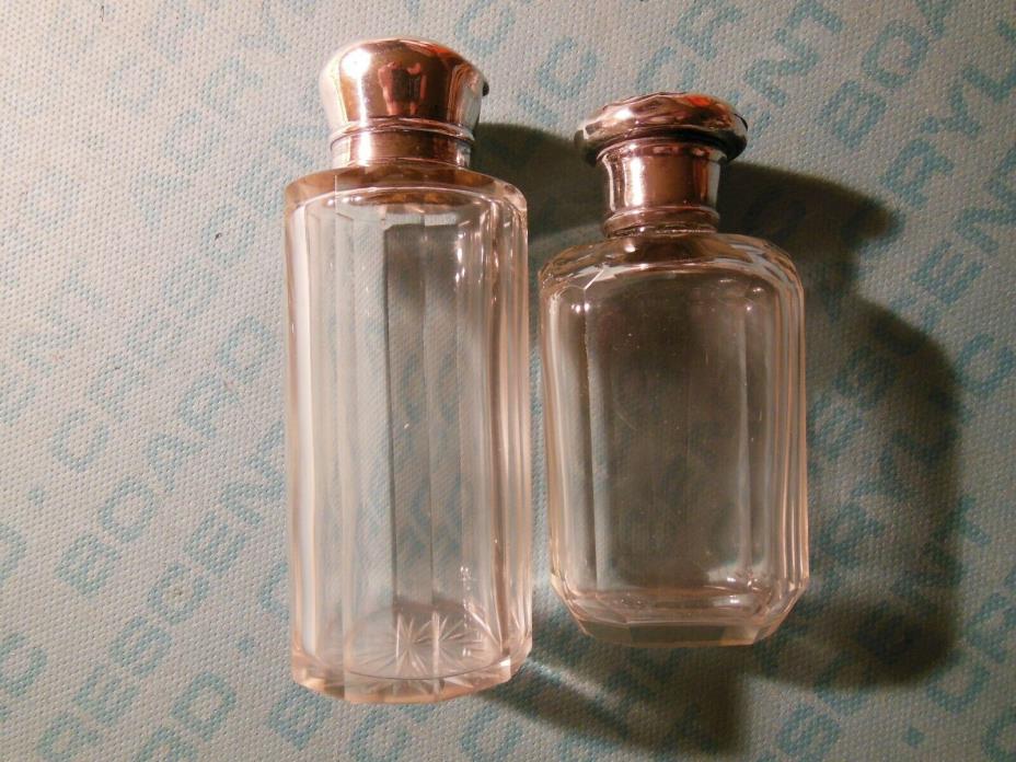 Two sterling silver & cut glass cologne bottles, English hallmarks