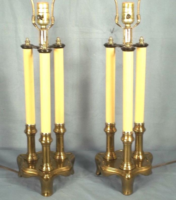 PAIR OF MID CENTURY BRASS 3 COLUMN CANDLESTICK LAMP ON FOOTED BASE