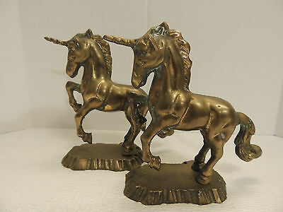 pair 2 antique heavy solid Brass prancing Unicorns on base 4 1/2