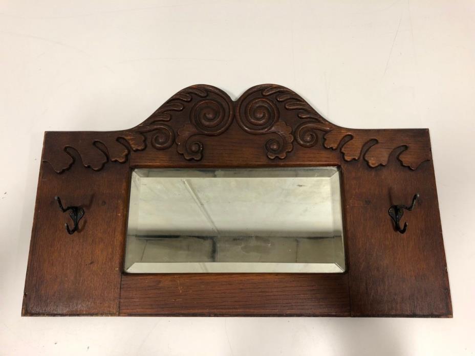 Antique Oak Wood Framed Beveled Glass Mirror with Scrolling Detail Hanging Hooks
