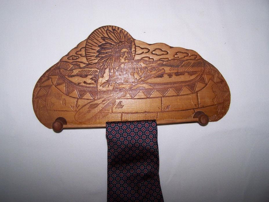 VINTAGE PYROGRAPHY TIE HOLDER OR RACK CHEIF IN CANOE