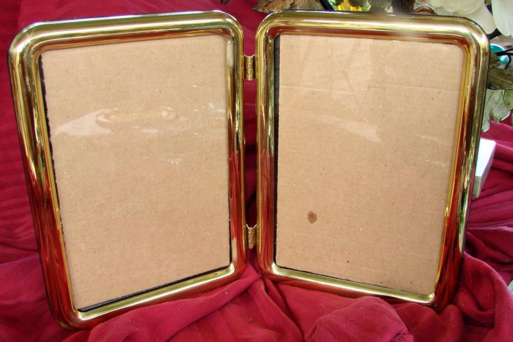 DOUBLE BRASS PICTURE FRAME-6.5X4.4 EACH SIDE NICE HEAVY VINTAGE FRAME GRT. COND.