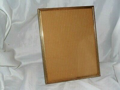 PRE-OWNED LARGE BRASS TONE METAL TABLE TOP PICTURE FRAME