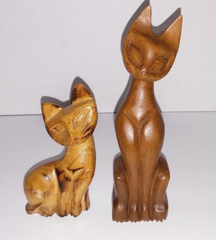 A pair of vintage teak hand carved  Siamese Spinx  cats