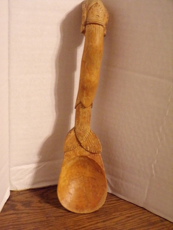 Vintage native Wooden Carved Scoop With Carved Face On Handle