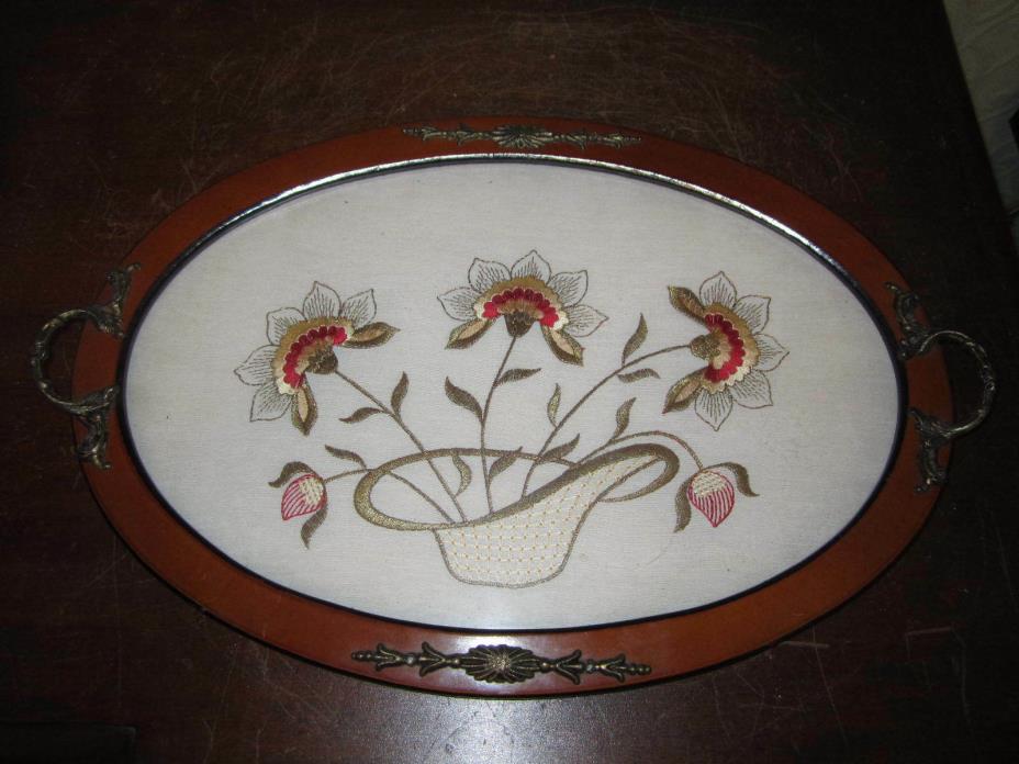 An old wood, glass and embroidery tray