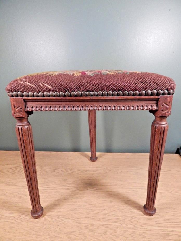 ANTIQUE FRENCH UNUSUAL TRIANGULAR CARVED FOOTSTOOL WITH OLD NEEDLEPOINT COVER