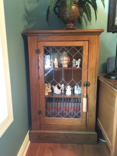 Matching Antique Leaded Glass Bookcases.   Same color just different lighting.