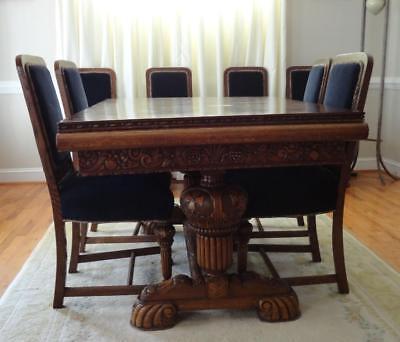 c. 1930 Carved Renaissance Revival Oak Extending Dining Table; 8 Matching Chairs