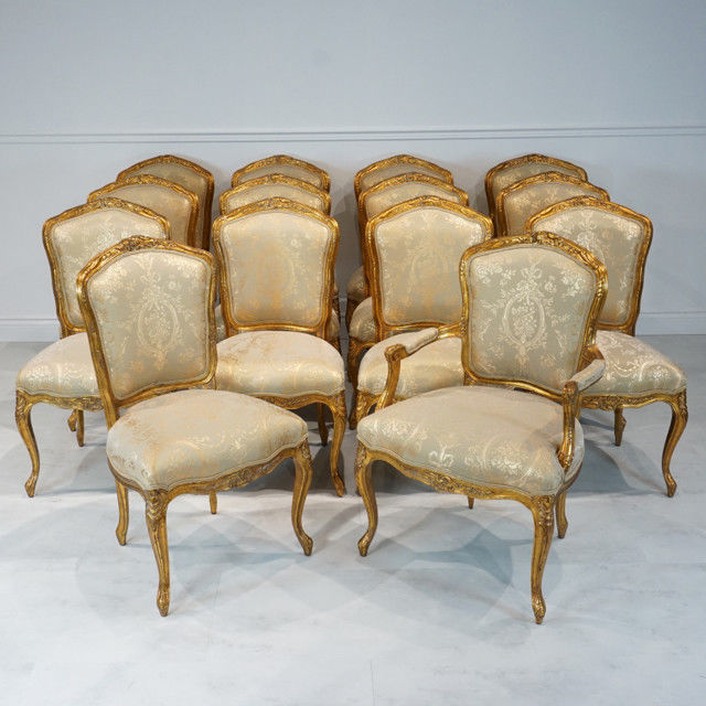 Stunning Set of 14 Louis XV French mahogany dining chairs with gold leaf