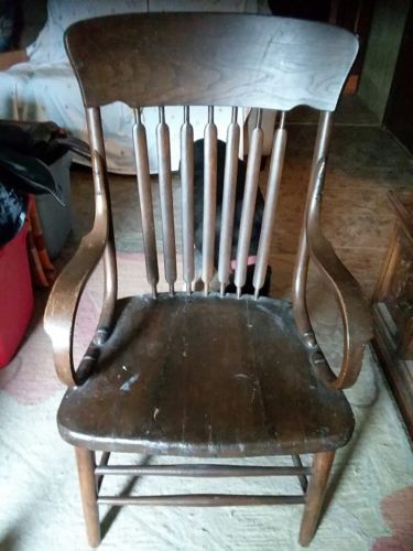 Antique chairs with arms tiger oak ? Black walnut ?