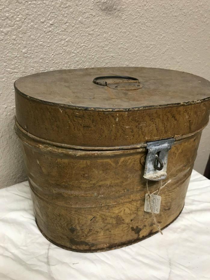 Antique metal hatbox for steamer travel