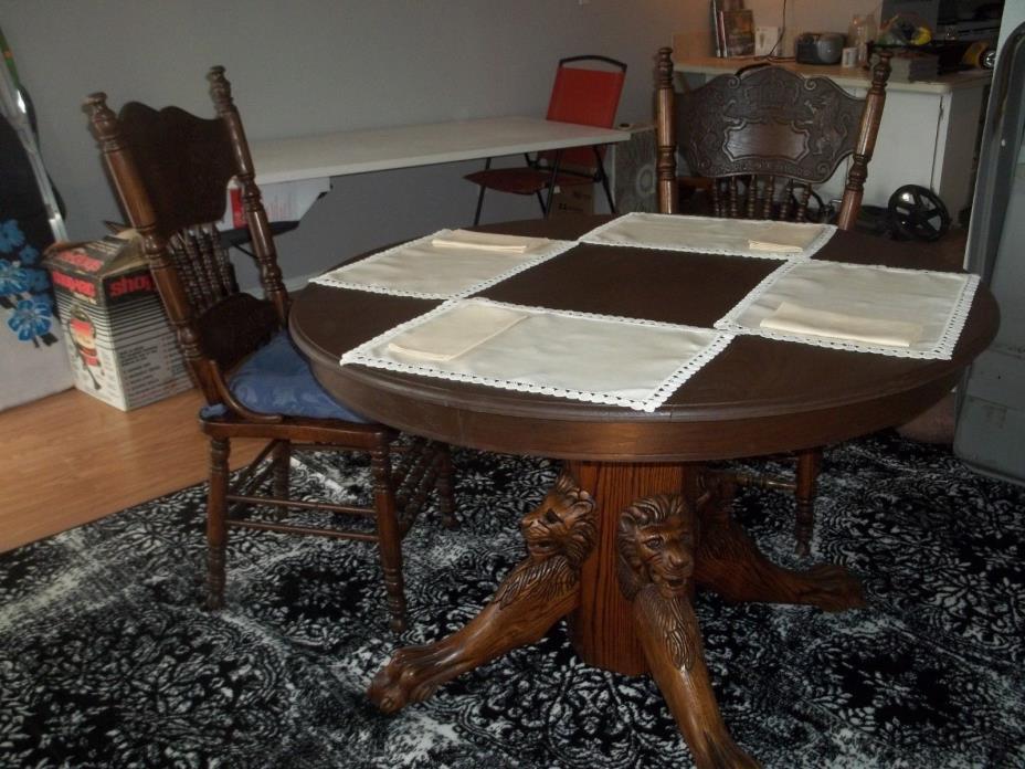 Antique Oak Lions Head Table and two chairs