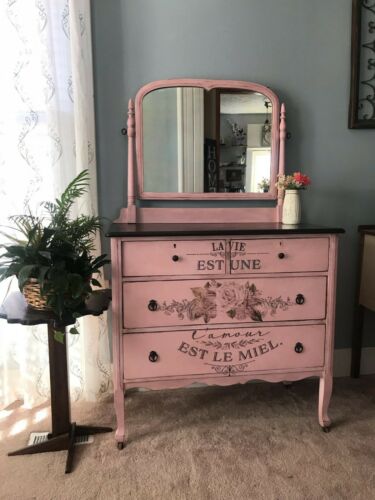 Pink dresser with flowers, mirror