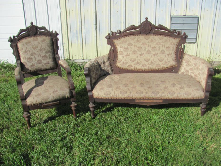ANTIQUE ORNATE VICTORIAN WALNUT LOVE SEAT AND MATCHING ARM CHAIR