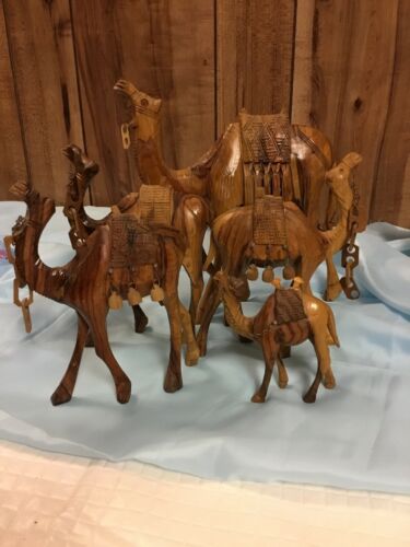 Set Of Five Handcarved Teakwood Camels