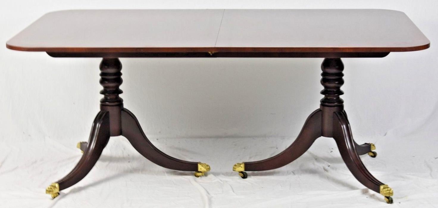 Baker Williamsburg Collection Banded Mahogany Dining Table with Brass Paws