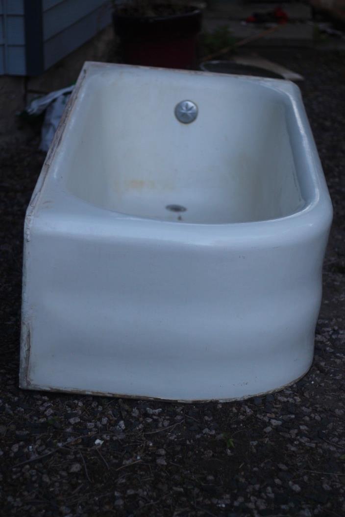 Porcelain covered cast iron bathtub