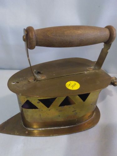 vintage coal ironing tool
