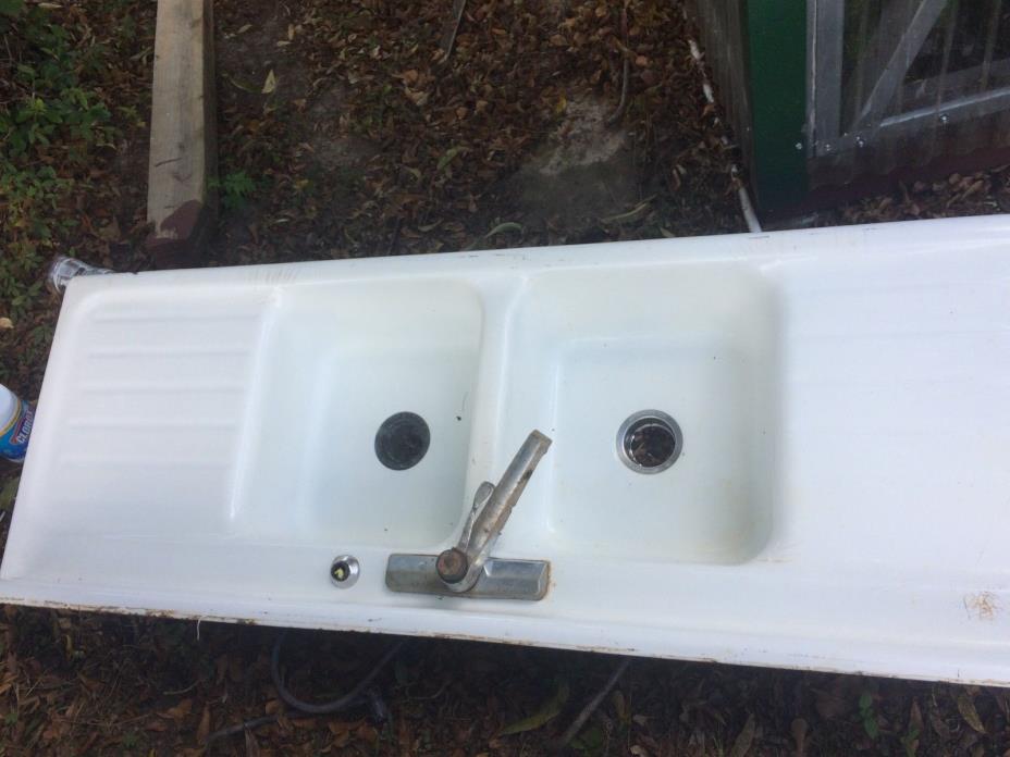 vintage cast iron double sink with double drainage boards