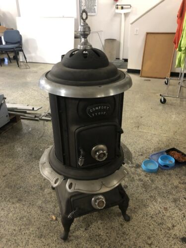 VINTAGE POT BELLY STOVE  - Completely hand rebuilt.  Brightwork is nickel plated