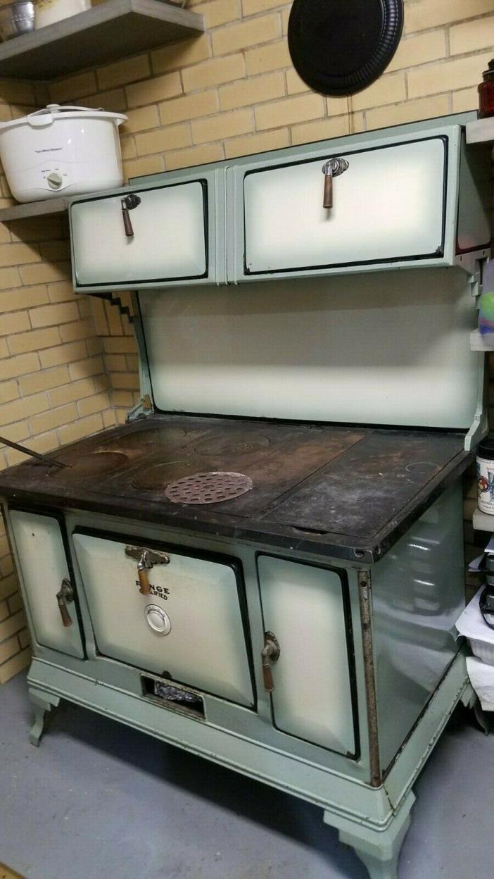 Early 20th century  wood cook stove by Range Qualified