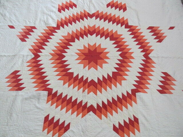Antique Texas Lone Star quilt in red and coral hand quilted from estate