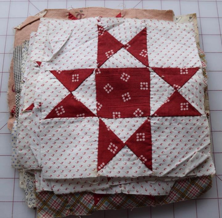 29 antique 1870's Ohio Star/Variable Star quilt blocks, red and white shirtings!